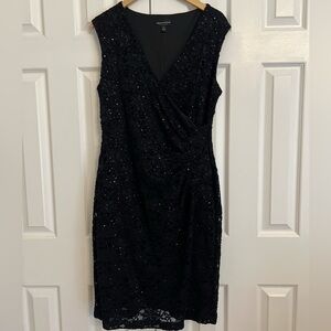 Great for holiday parties or New Years Eve! Sparkly black dress size 14